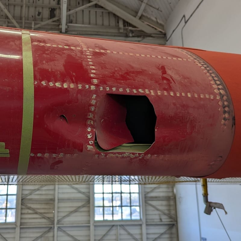 A collision with an unauthorized drone left a 3-inch by 6-inch hole in the left wing of a “super scooper” aircraft last year. Credit: U.S. Forest Service.