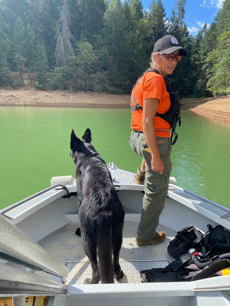 A Nevada County Search and Rescue worker patrols Rollins Lake with a cadaver dog. Photo by Nevada County Sheriff’s Office.