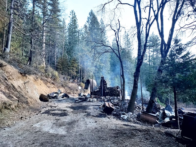 The April 17th fire destroyed an Alleghany home and spread to nearby vegetation.