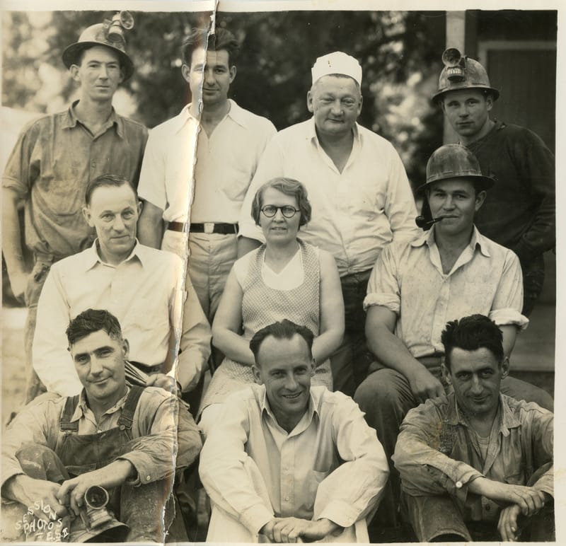 Kenton Mine Crew and staff, June 22, 1936 man in top left corner is Cecile Vivian, man in far right corner with dark shirt is Elliott “Al” Hope. Photos courtesy of undergroundgold.org.