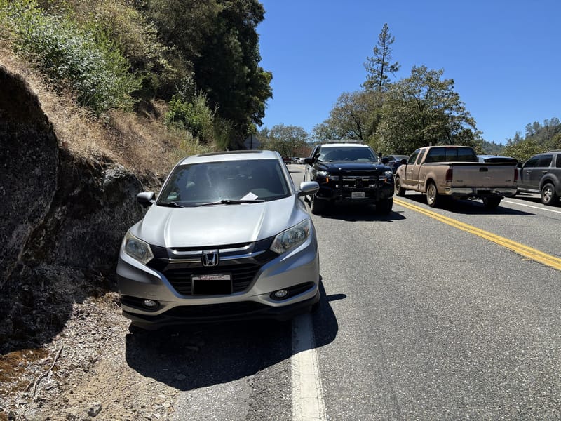 Another vehicle parked illegally, touching the white fog line on Highway 49. Photo: CHP – Grass Valley