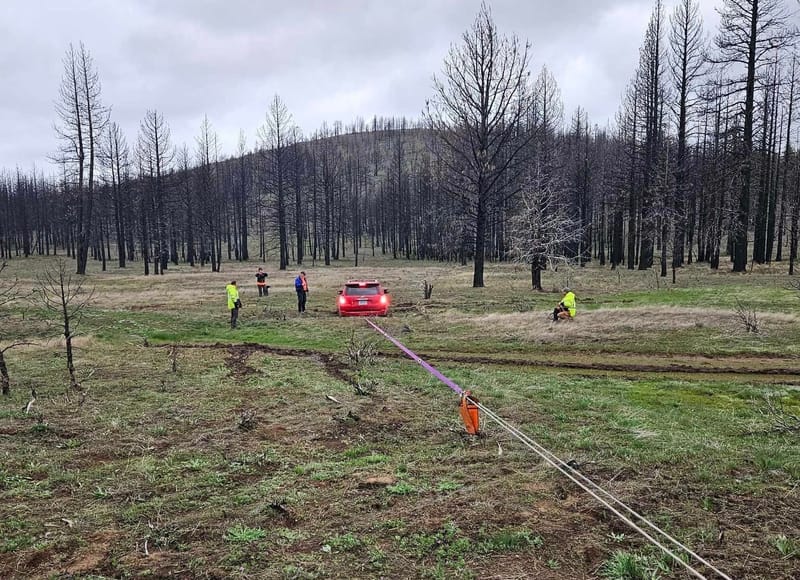The first vehicle to be stuck is winched out by Search and Rescue