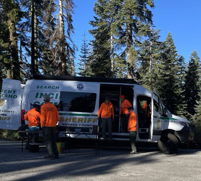 The Nevada County Sheriff’s Incident Command vehicle and rescue volunteers.