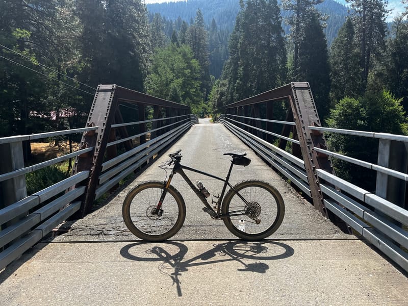 A gravel bike on a bridge.