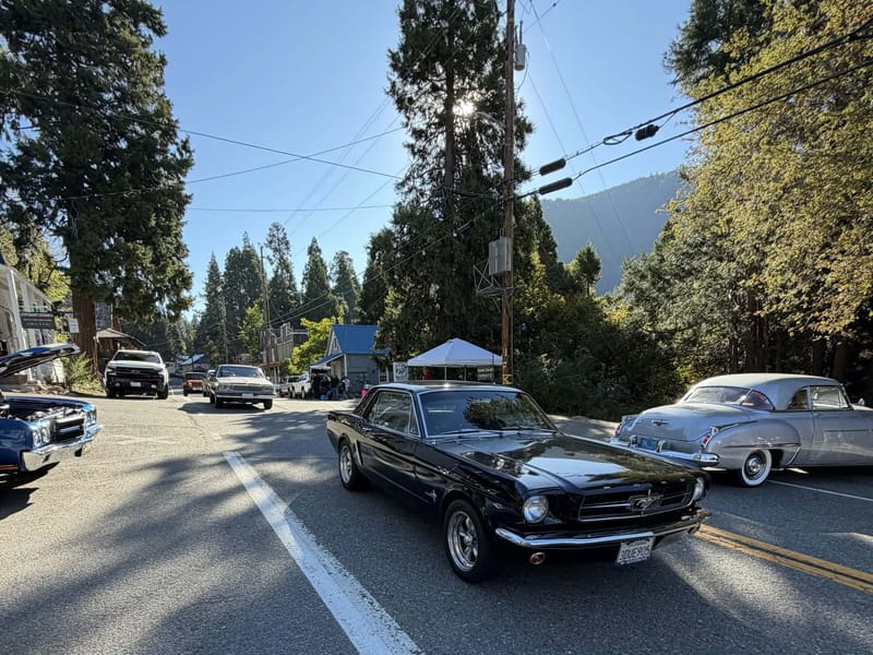 Hot rods parade down Main Street in Sierra City.