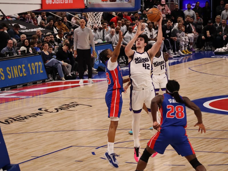 Maxime Raynaud shoots a layup against the Detroit Pistons.