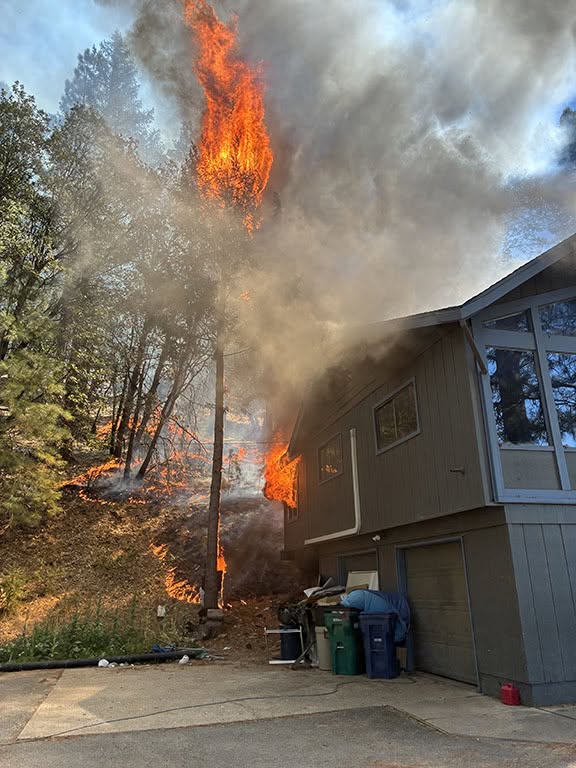 The path fire burns a residence in the Quincy area.