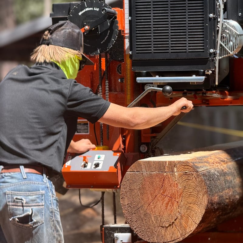An intern operates Nevada Joint Union High School District’s sawmill.
