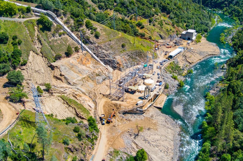 Crews work to remove tens of thousands of cubic yards of sediment around the New Colgate Powerhouse on the North Yuba River. Photo: Alex Boesch/Yuba Water Agency.
