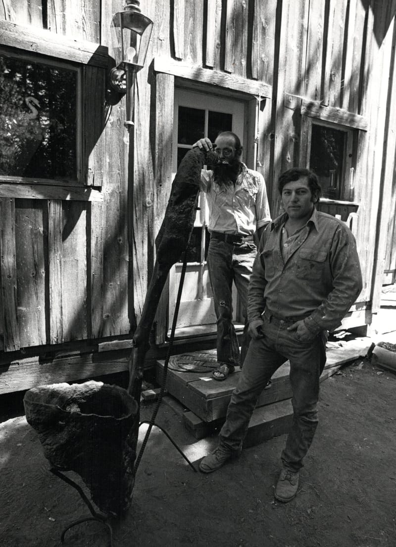 Don Bell and Vern Sheppard with pipe. Golden Bear Mine Bunkhouse, 1978.