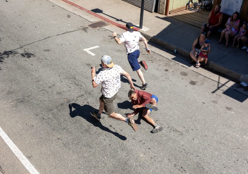Andy Flores takes a spill in the 40-and-up men’s race