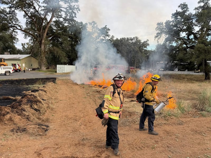 Firefighters during the live fire training. Credit: Dobbins - Oregon House Fire Department / Facebook.