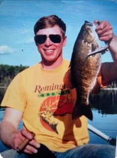 Dale Wheaton in his prime…cigar in one hand, fish in the other.