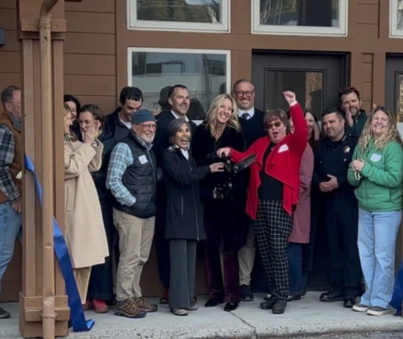 Participants celebrate the ribbon cutting outside the Truckee Navigation Center.