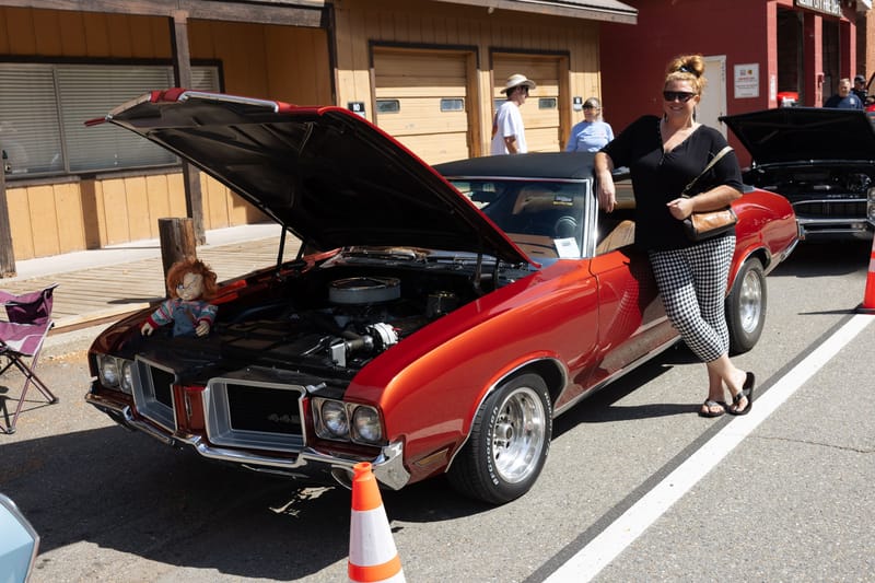 Hanne Waller and her Chucky-decorated Oldsmobile