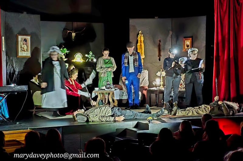 The cast makes do in the dark on Friday. Photo by Mary Davey.