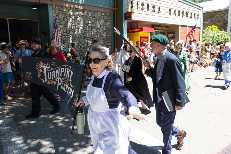 The Sierra Turnpike Players, including The Messenger’s owner Carl Butz (right), participated in the parade.