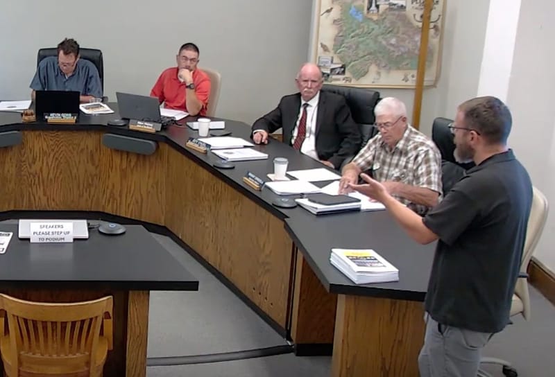 Zachary Gately updates the Plumas County Board on public meeting dates and locations.